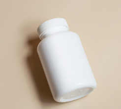 A white bottle with a cap

AI-generated content may be incorrect.