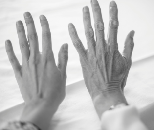 Close-up of a person's hands

AI-generated content may be incorrect.